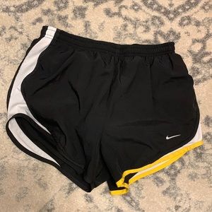 Nike black, yellow and white running shorts